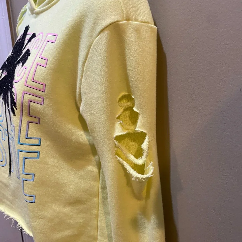 NWOT stylish Justice hooded palm tree sweatshirt with cut-outs size 12